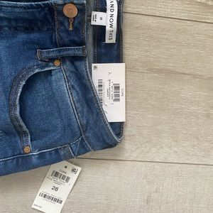 AND NOW THIS dark blue jeans